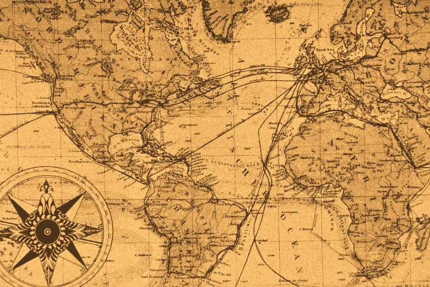 Antigo mapa-múndi detalhado com rotas de navegação histórica e rosa dos ventos.