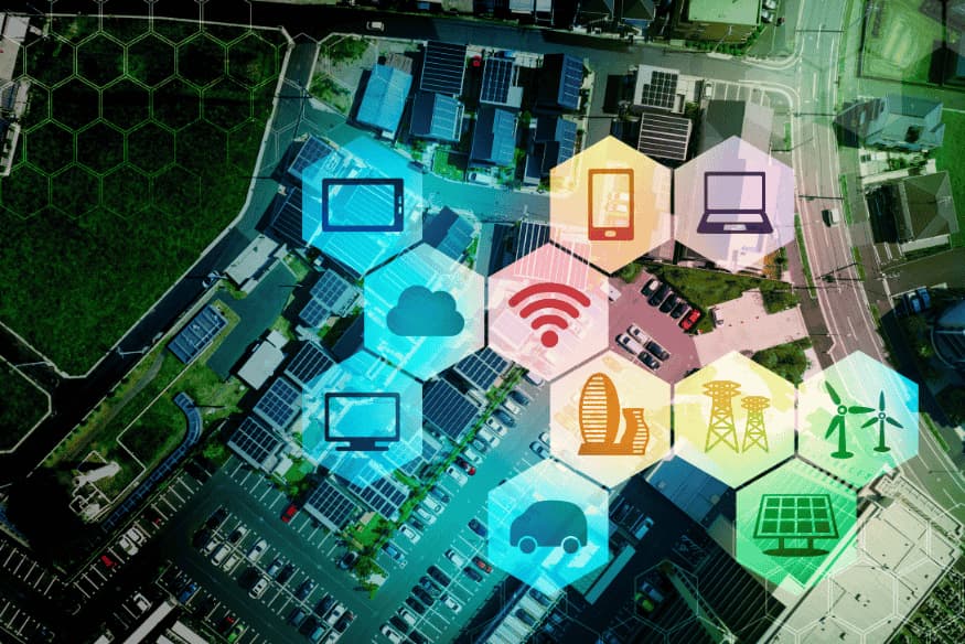 Ilustração de uma cidade inteligente com ícones de conectividade e tecnologia, simbolizando a Internet das Coisas aplicada à segurança veicular