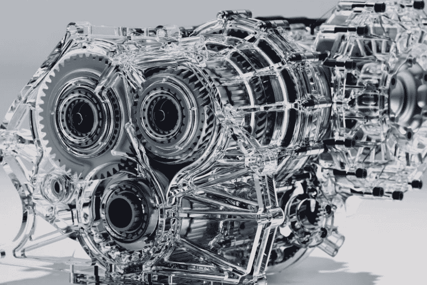 Motor V8 biturbo do Koenigsegg Jesko representado em estrutura translúcida de alta tecnologia.